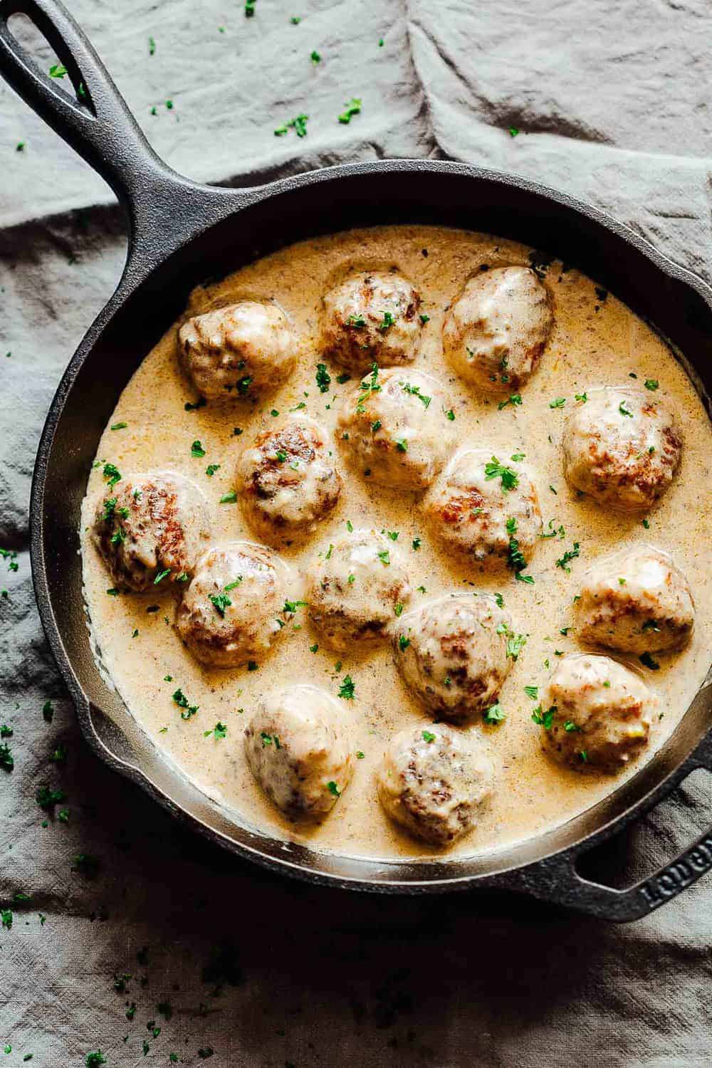 Creamy Cajun Chicken Meatballs are soft, juicy chicken meatballs slathered in a creamy gravy flavoured with cajun seasoning. This one pot recipe is the perfect dinner option!