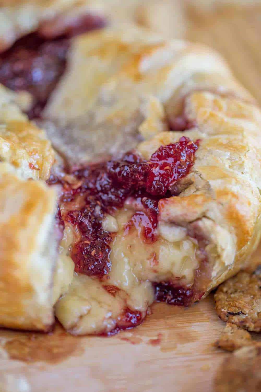 Creamy, delicious, baked brie with raspberry preserves.