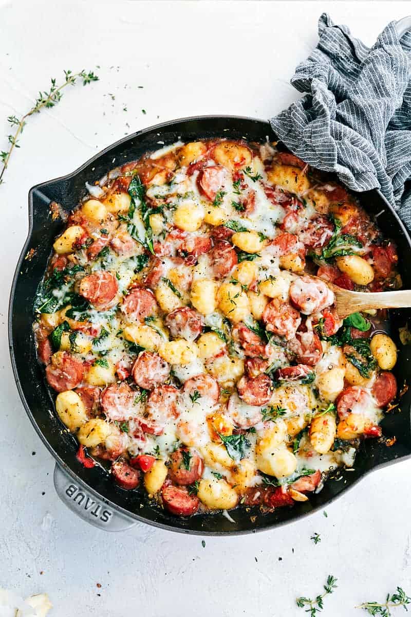 Spinach and Sausage Gnocchi in a skillet.