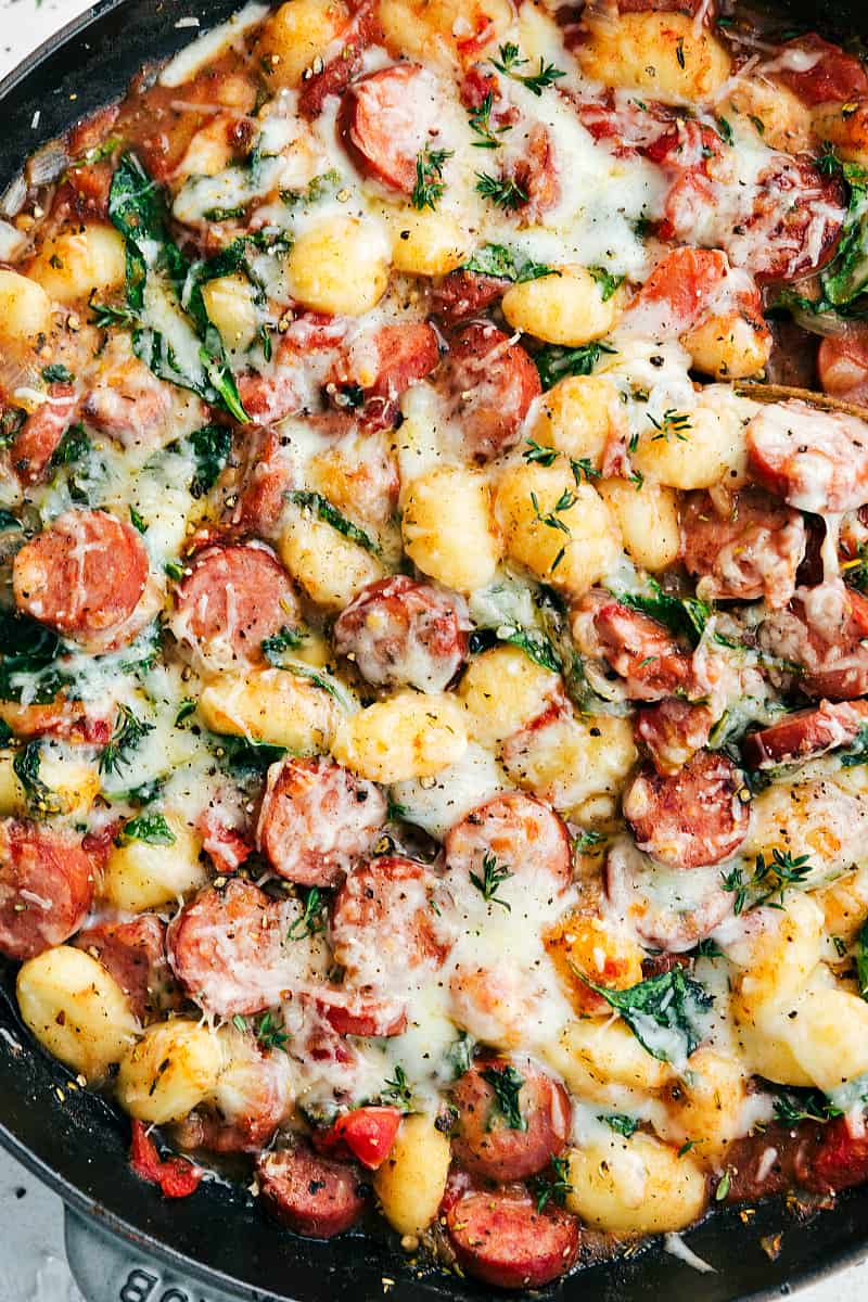 Spinach and Sausage Gnocchi with Sage in a skillet.