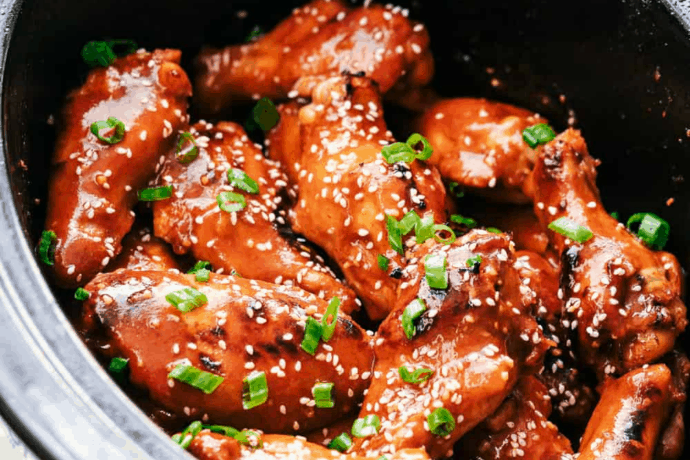 Slow Cooker Honey Garlic Sriracha Wings | The Recipe Critic