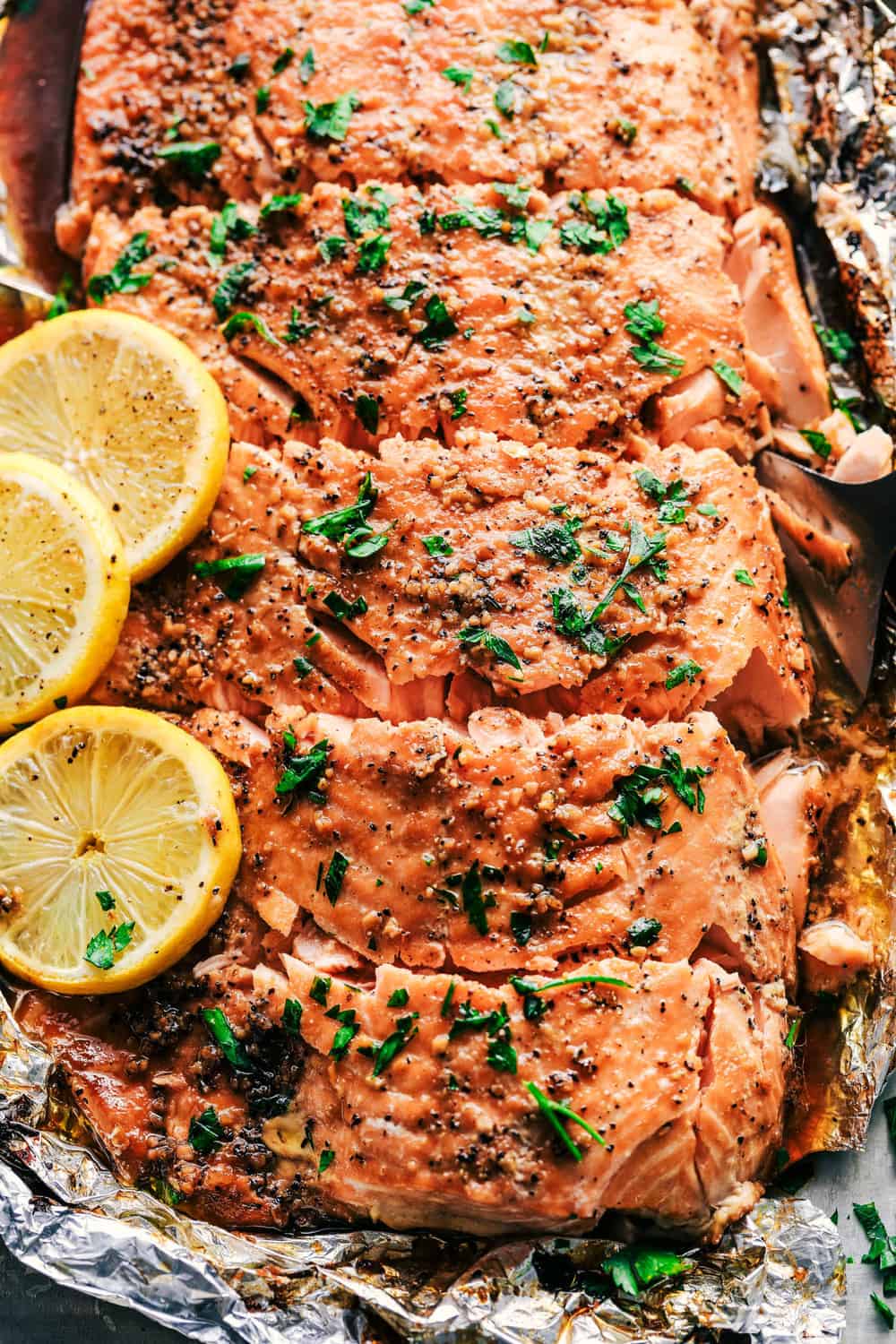 Garlic Brown Sugar Glazed Salmon cut into servings.