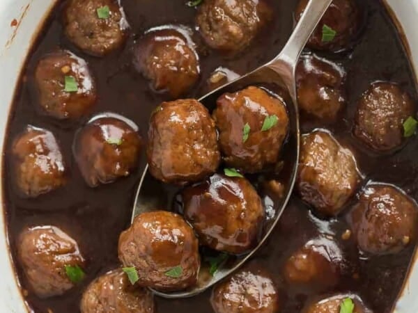 These Slow Cooker Cranberry Balsamic Meatballs are perfect for a holiday dinner or party! Sweet, tangy and so easy!