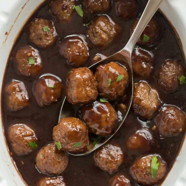 These Slow Cooker Cranberry Balsamic Meatballs are perfect for a holiday dinner or party! Sweet, tangy and so easy!