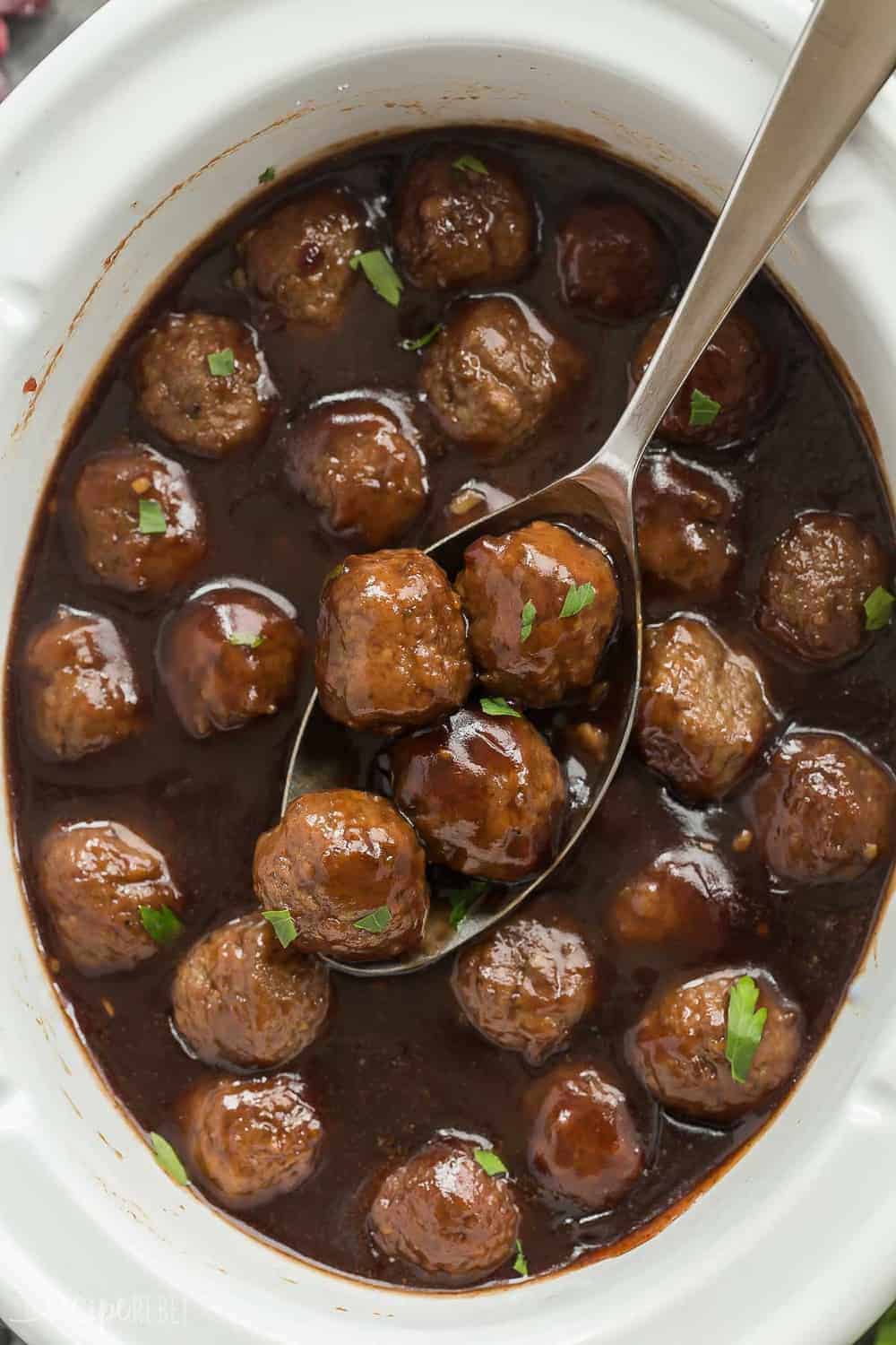 These Slow Cooker Cranberry Balsamic Meatballs are perfect for a holiday dinner or party! Sweet, tangy and so easy!