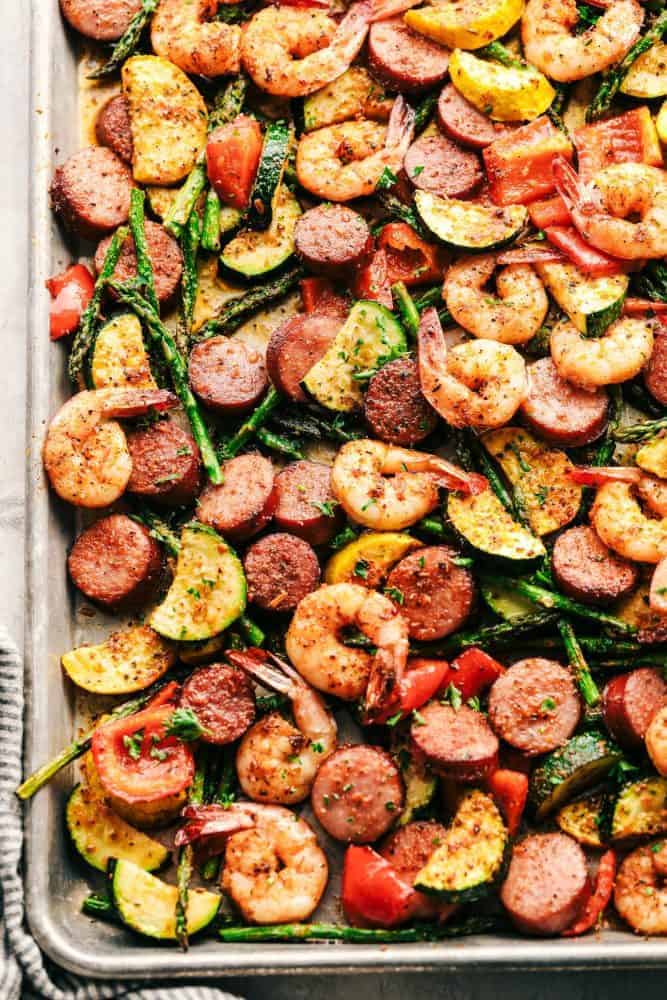 Cajun Shrimp and Sausage and Vegetables on a sheet pan. 