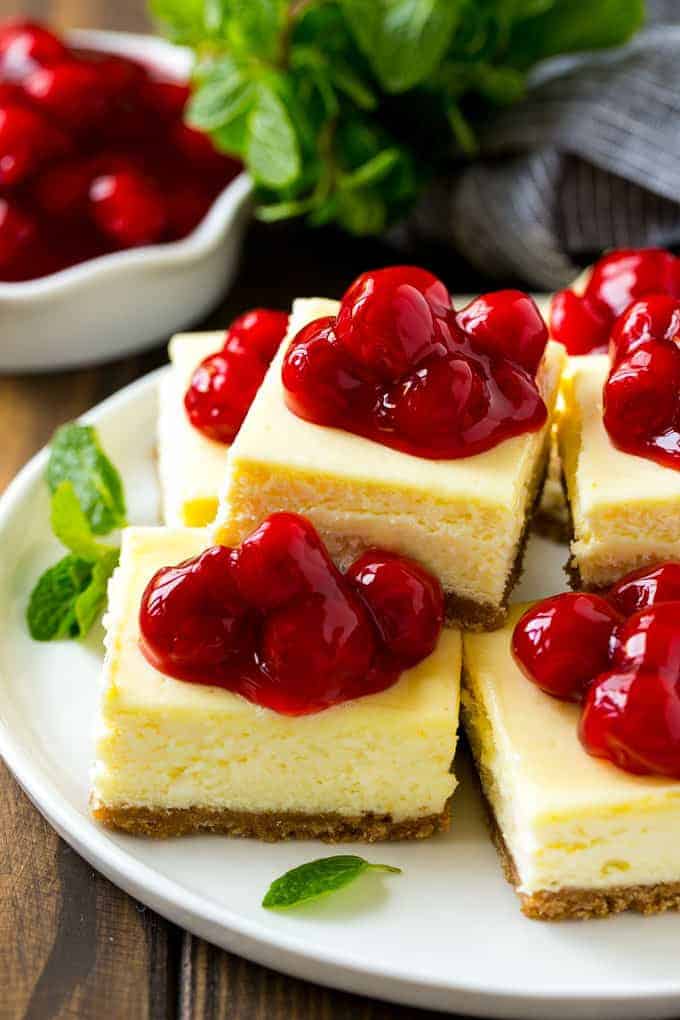 These cherry cheesecake bars are the perfect make-ahead dessert for any occasion! Creamy cheesecake sits atop a homemade graham cracker crust, and is finished off with a generous helping of cherries.