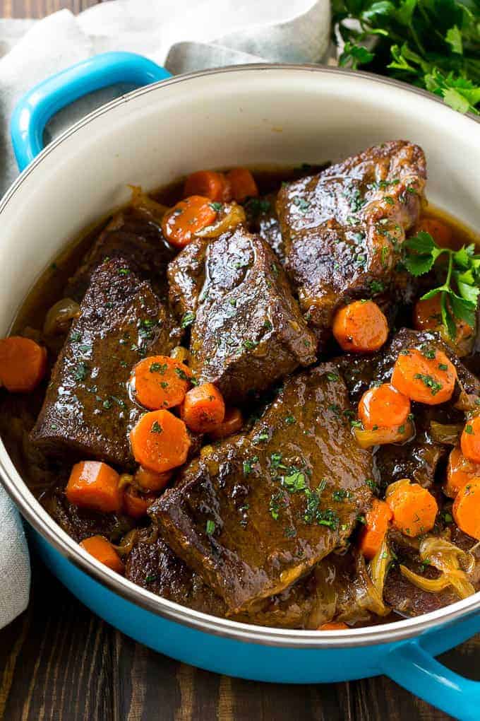 These fork tender root beer glazed short ribs are the perfect meal for a cold winter night. Serve them over mashed potatoes for a dinner that's sure to earn rave reviews from family and friends!