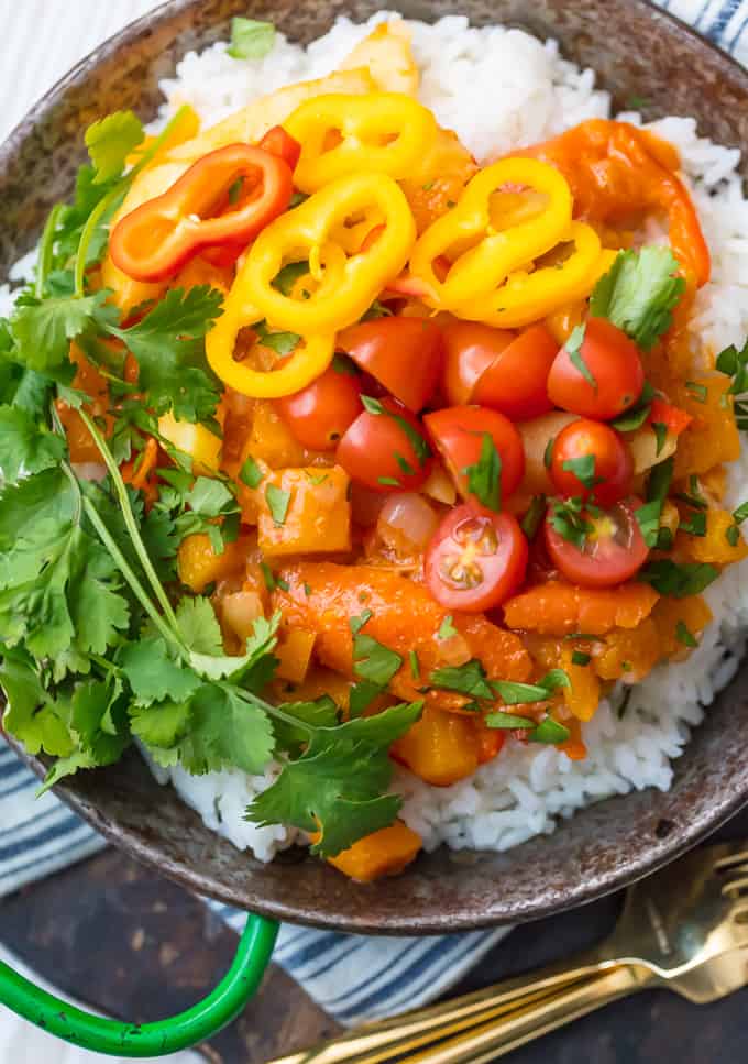 Vegetable Curry over white rice in a bowl with forks. 