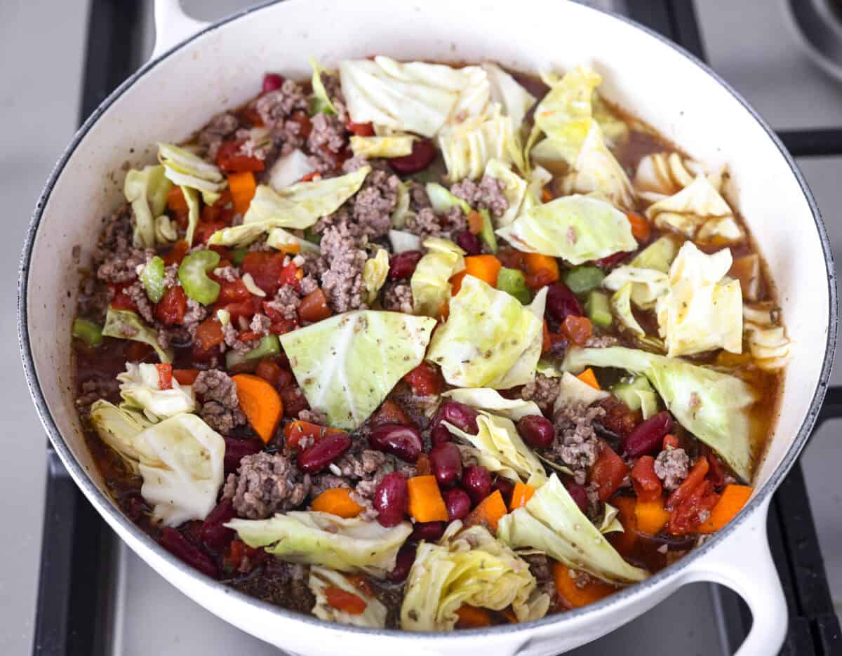 Overhead shot of all of the ingredients mixed together in a pot.