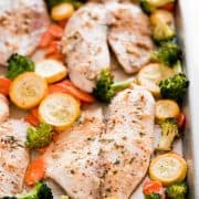This Baked Tilapia and Roasted Veggies is a low calorie and high protein dish that comes together in less than 25 minutes! 