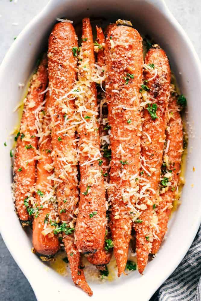 Garlic Butter Parmesan Carrots in a white dish. 