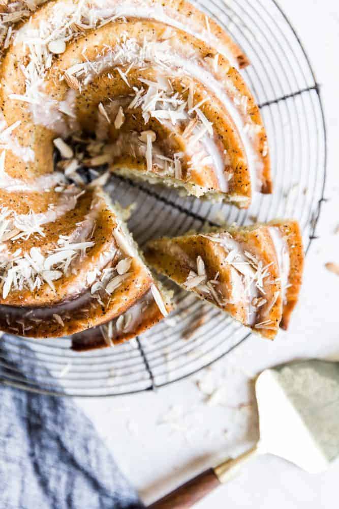 Close up of a slice being removed from the bundt cake. 