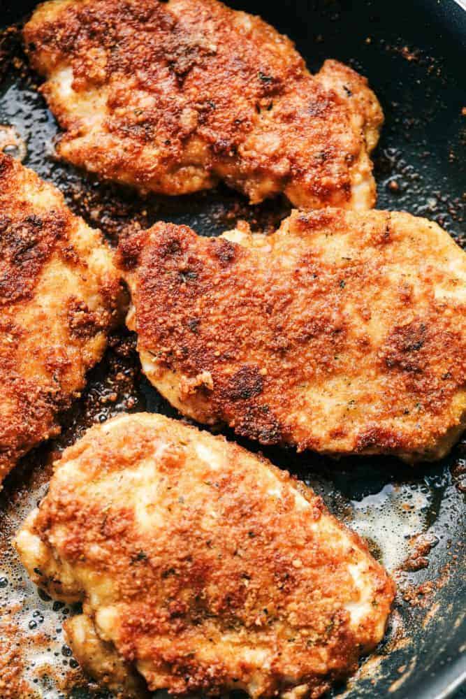 Crispy Garlic Chicken in a skillet. 