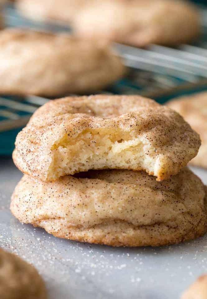 Cream Cheese Snickerdoodles. One with a bite taken out of it. 