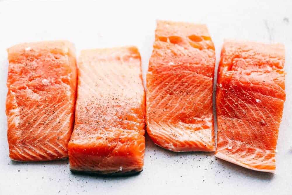Uncooked salmon fillets.