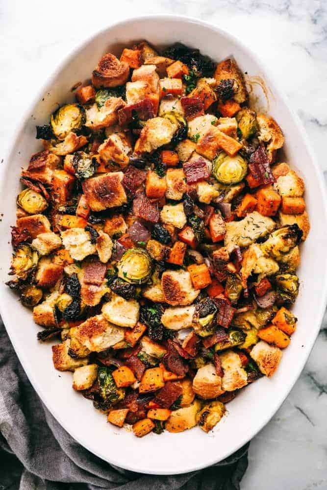.Roasted Autumn Vegetable Stuffing in a white dish.