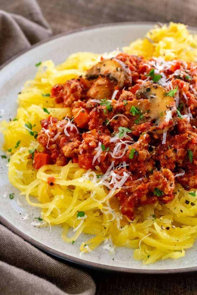 Ground turkey meat sauce served over spaghetti squash noodles
