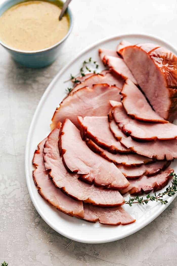 Classic honey glazed ham sliced on a plate