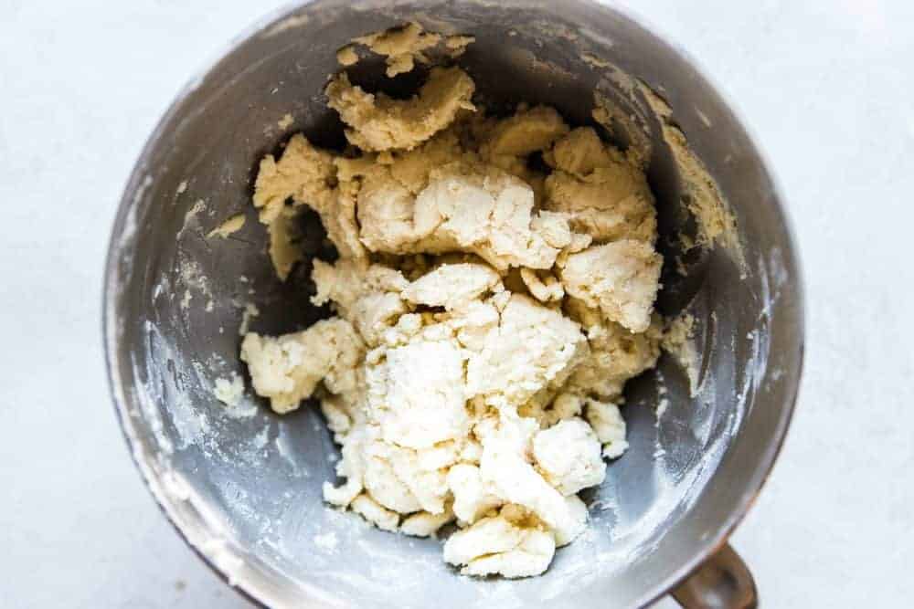 Dough in a mixer for shortbread cookies.