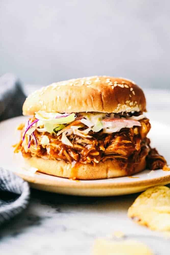 Slow Cooker BBQ Chicken sandwich on a plate.