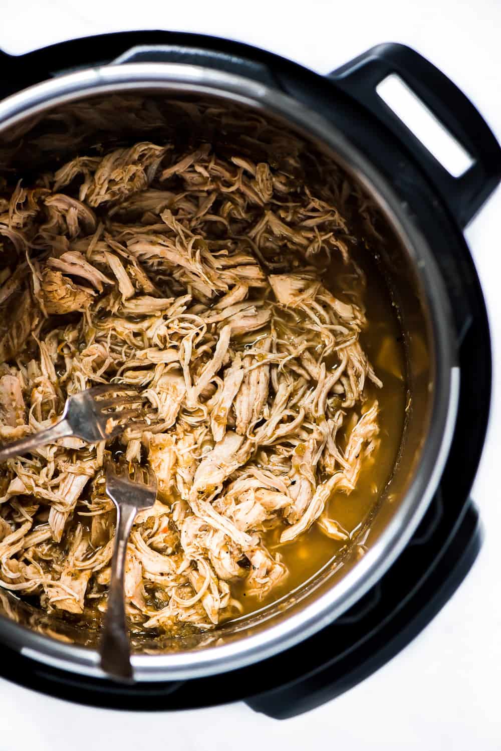 Cooked chicken in the crock pot.