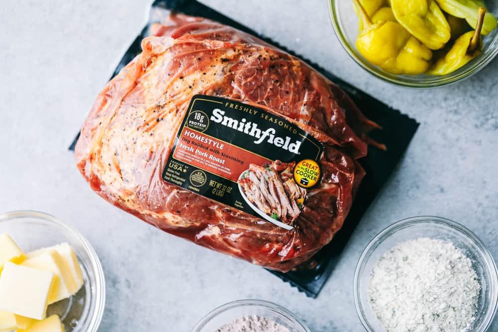 Slow Cooker Mississippi Pork Roast is a savory, sweet and spicy pork roast that is tender to the touch and falls apart with ease. It takes minutes to prepare and can be paired with a variety of sides. Your family will fall in love with this incredibly flavorful, melt in your mouth pork roast! Smithfield pork roast in wrapper.