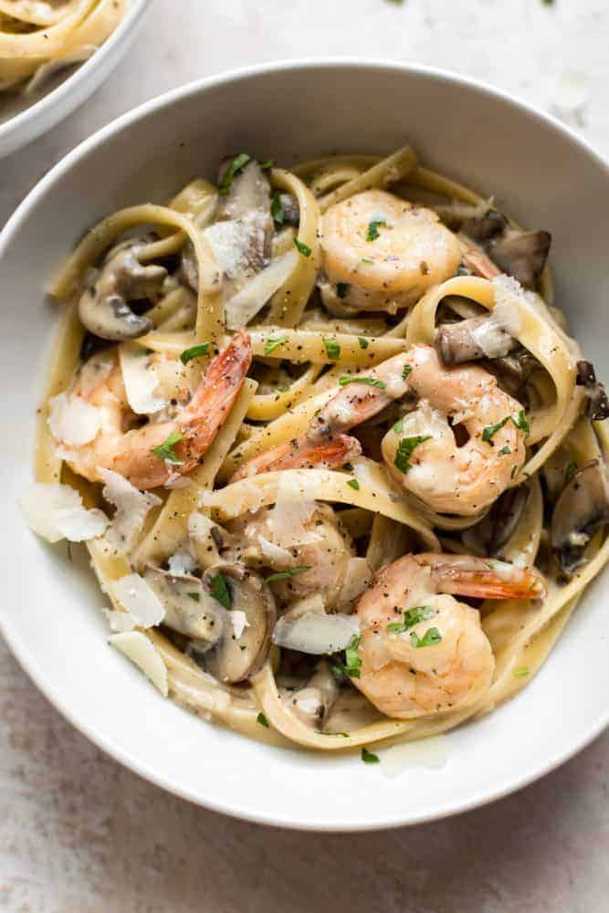 Creamy Shrimp and Mushroom Pasta in a white bowl.