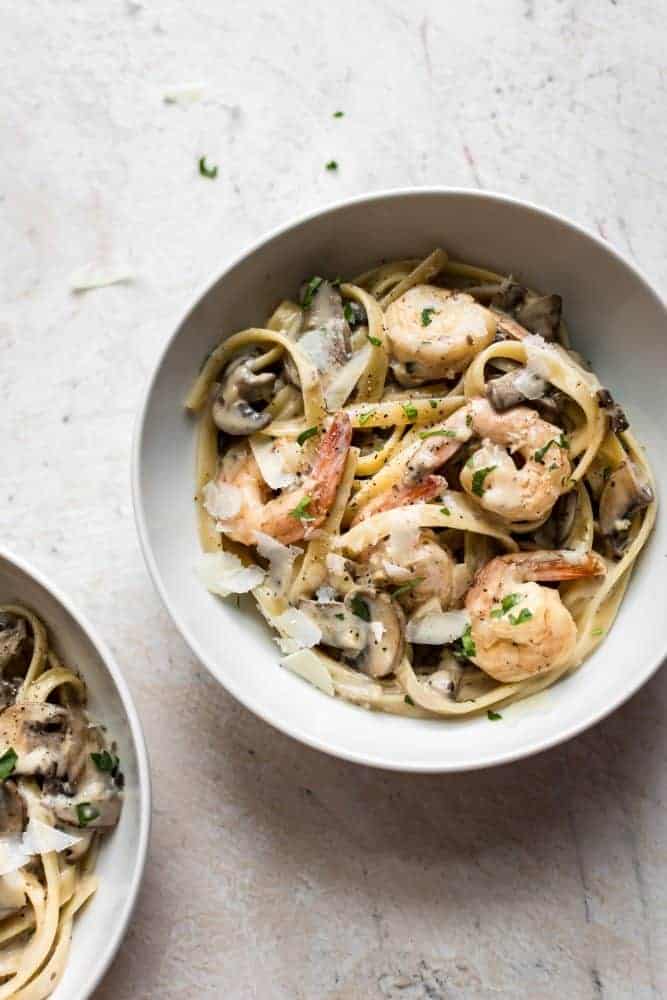 Creamy Shrimp and Mushroom Pasta in a white bowl.