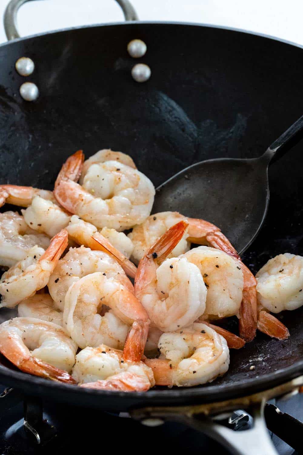 shrimp cooking in a wok