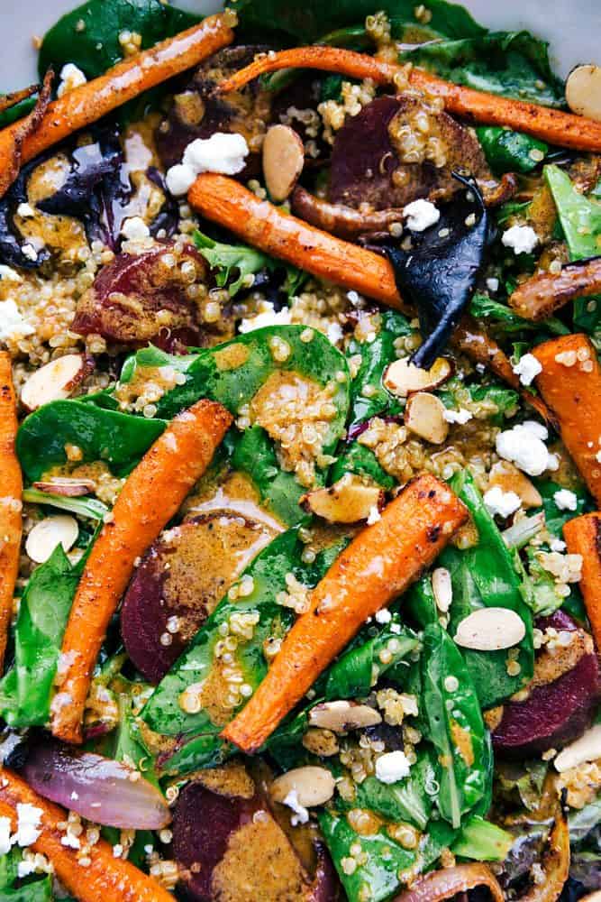 This roasted beet, quinoa, and carrot salad is packed with healthy and good-for-you ingredients! It's super flavorful and has the best lemon dressing!