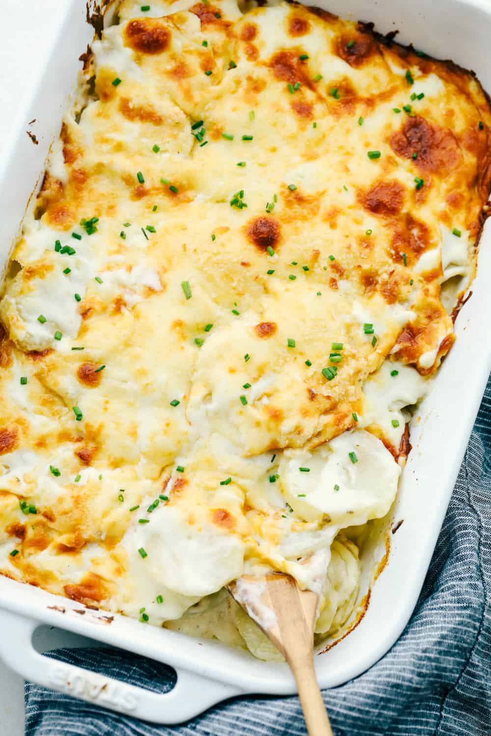 Cheesy, tender savory scalloped parmesan potatoes.