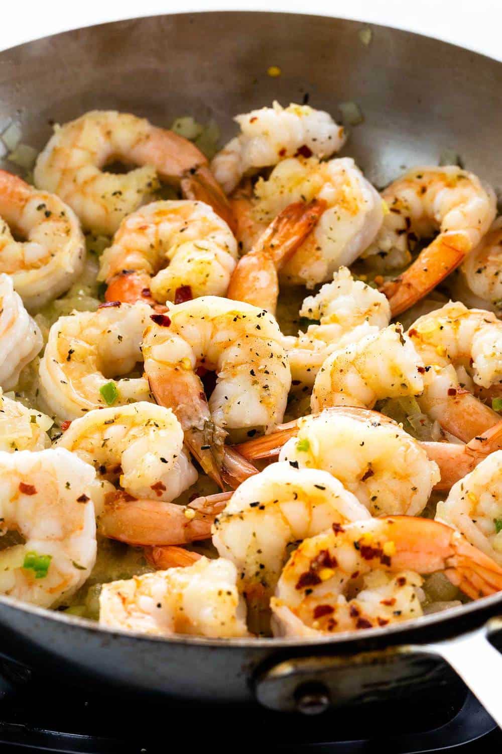 shrimp cooking in a skillet