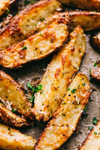 Best Ever Baked Parmesan Garlic Potato Wedges | The Recipe Critic