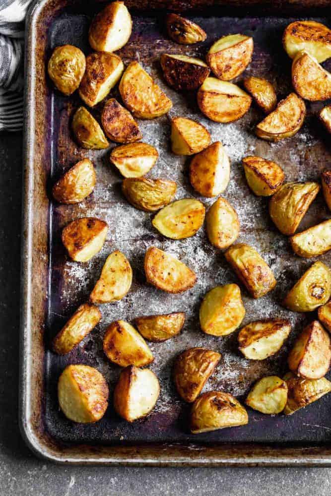 Potatoes after cooking on a sheet pan before seasoning.