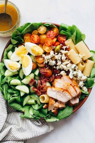 Pasta Cobb Salad served in a large bowl with vinaigrette