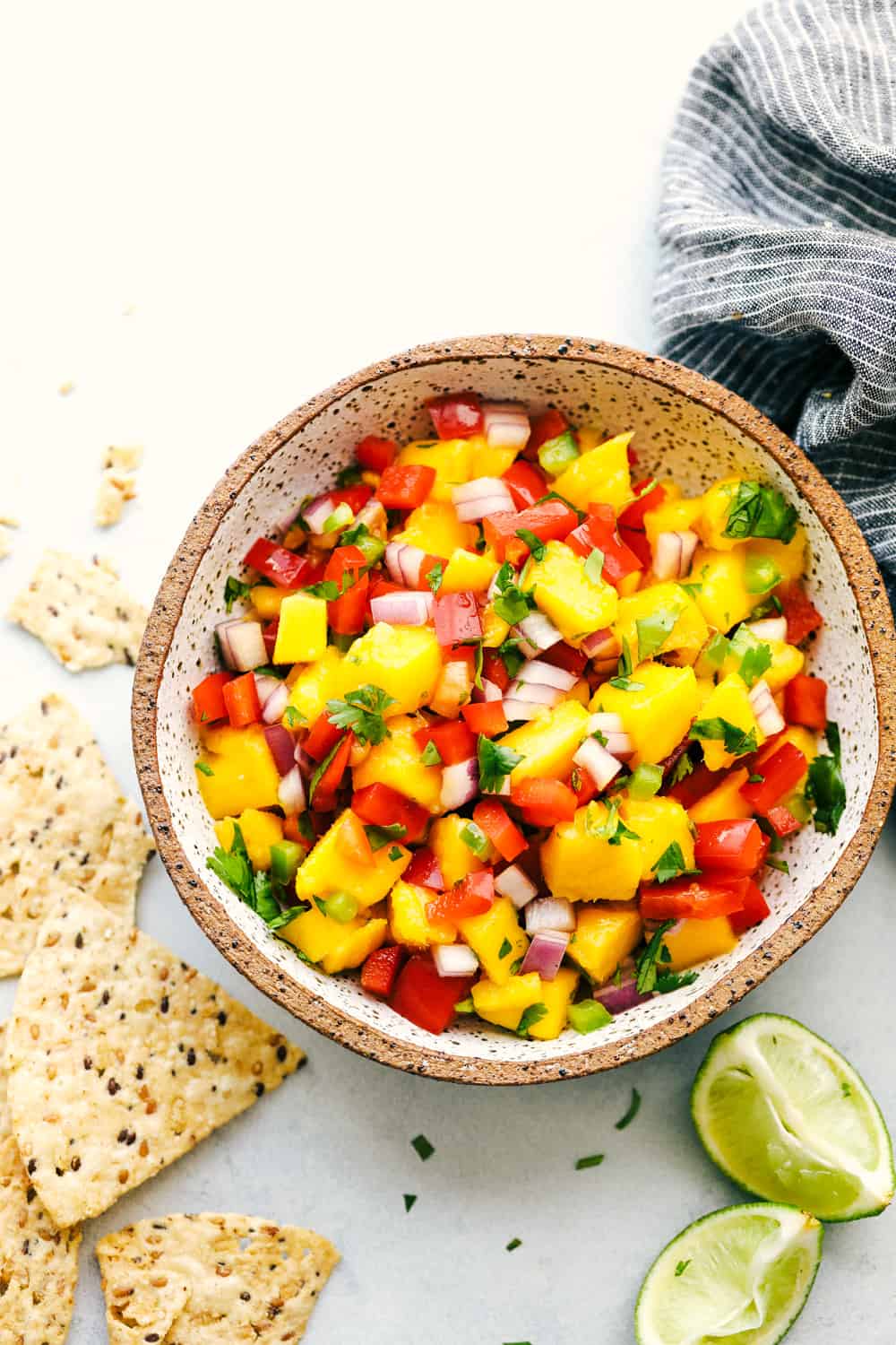 Overhead view of mango salsa in a bowl.