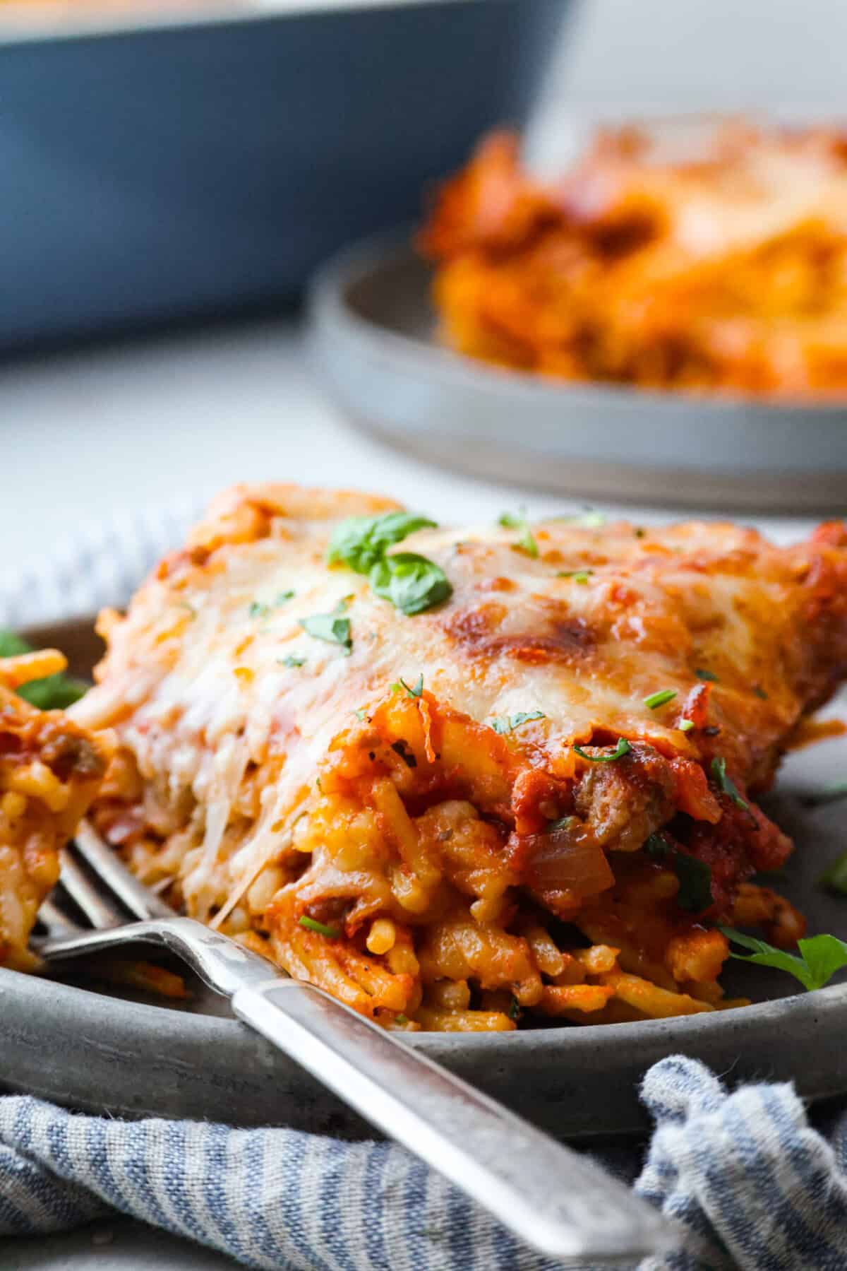 Close up shot of plated baked spaghetti. 