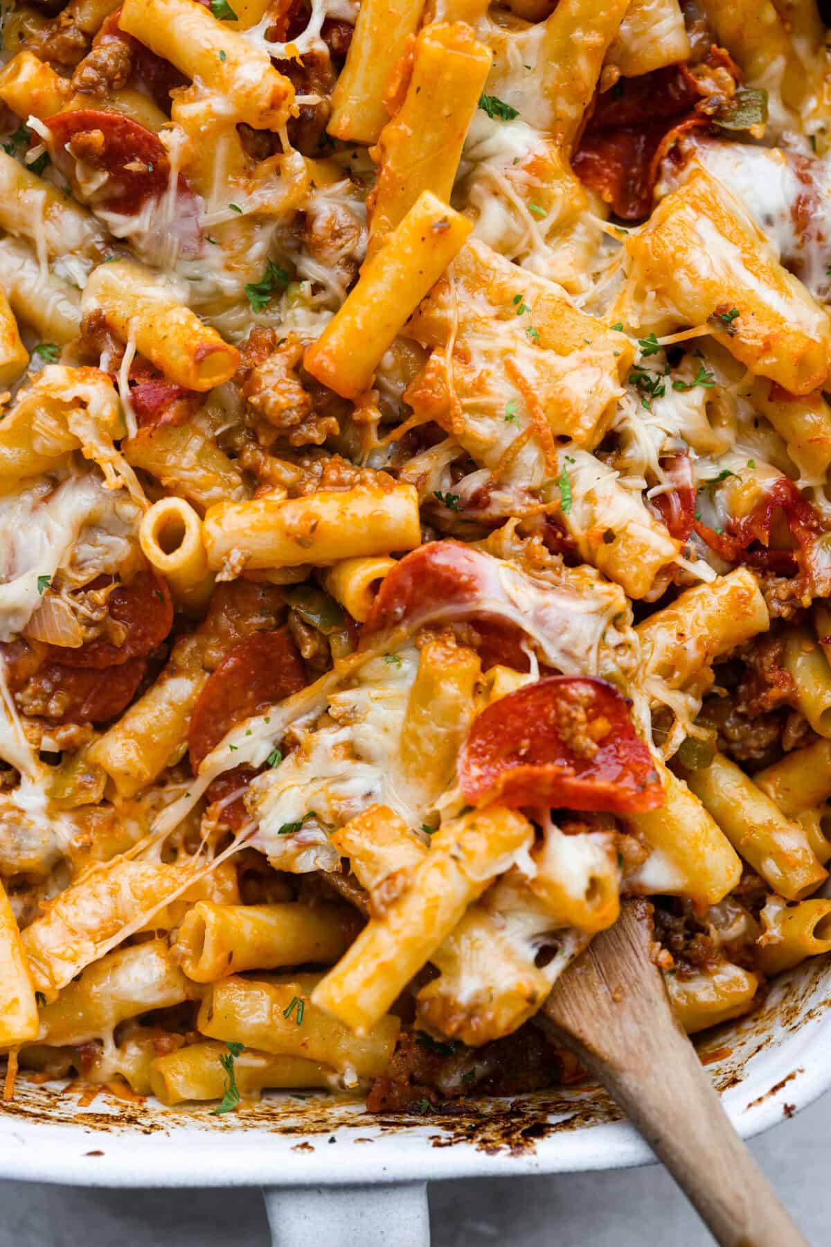 Close up shot of cheesy baked ziti. 