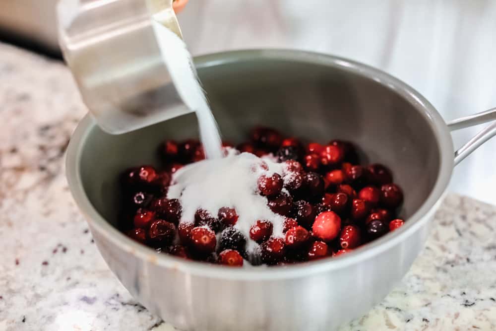 Cranberries having sugar poured over them