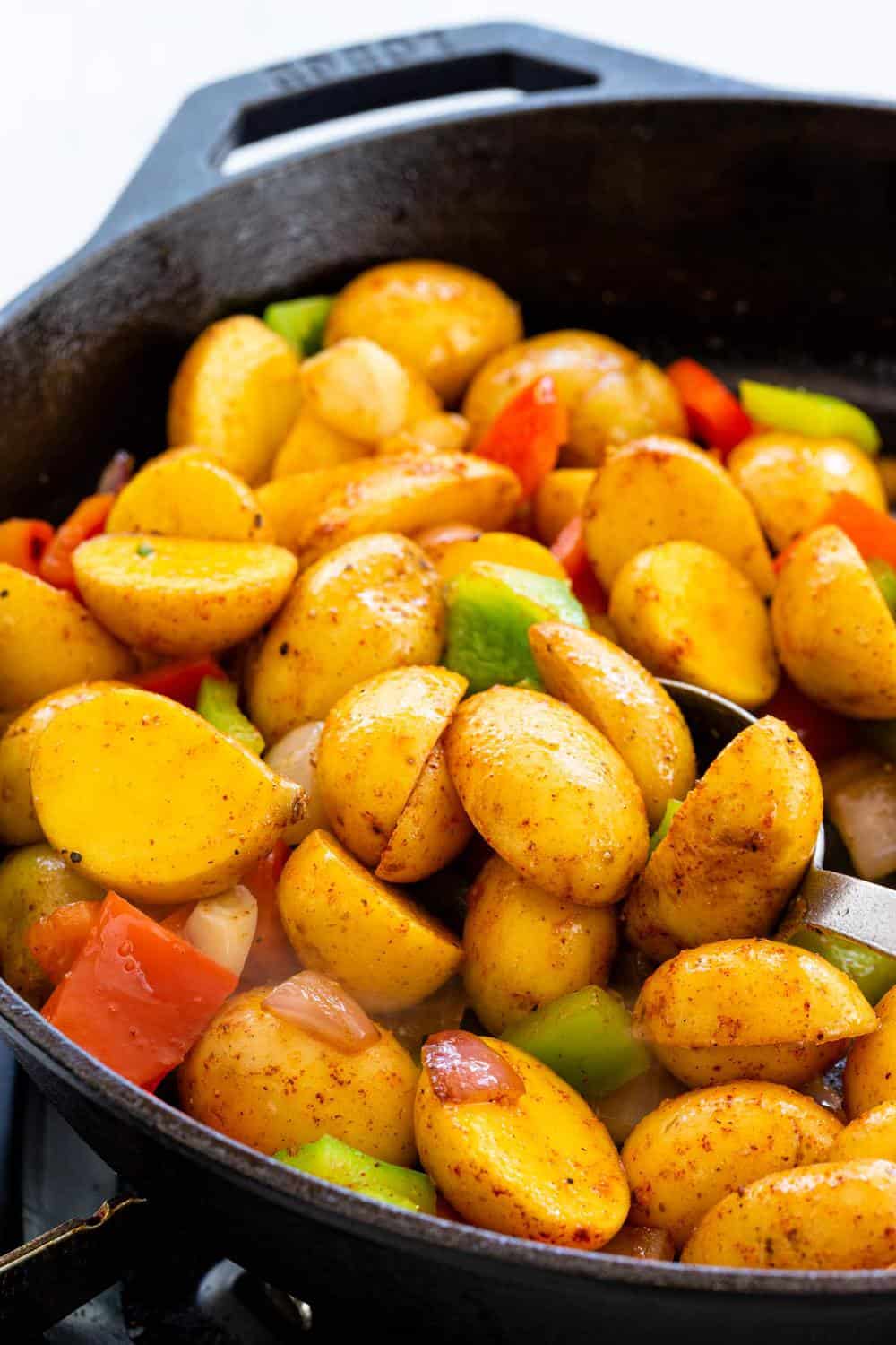 cooking potatoes in a skillet