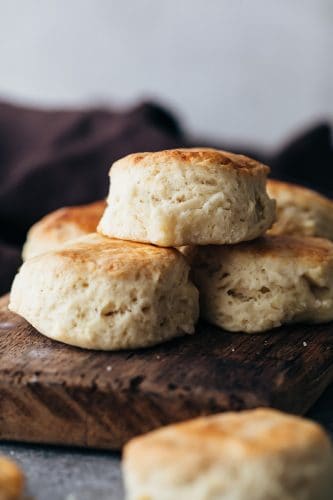 Buttermilk biscuits piled one on top of the other