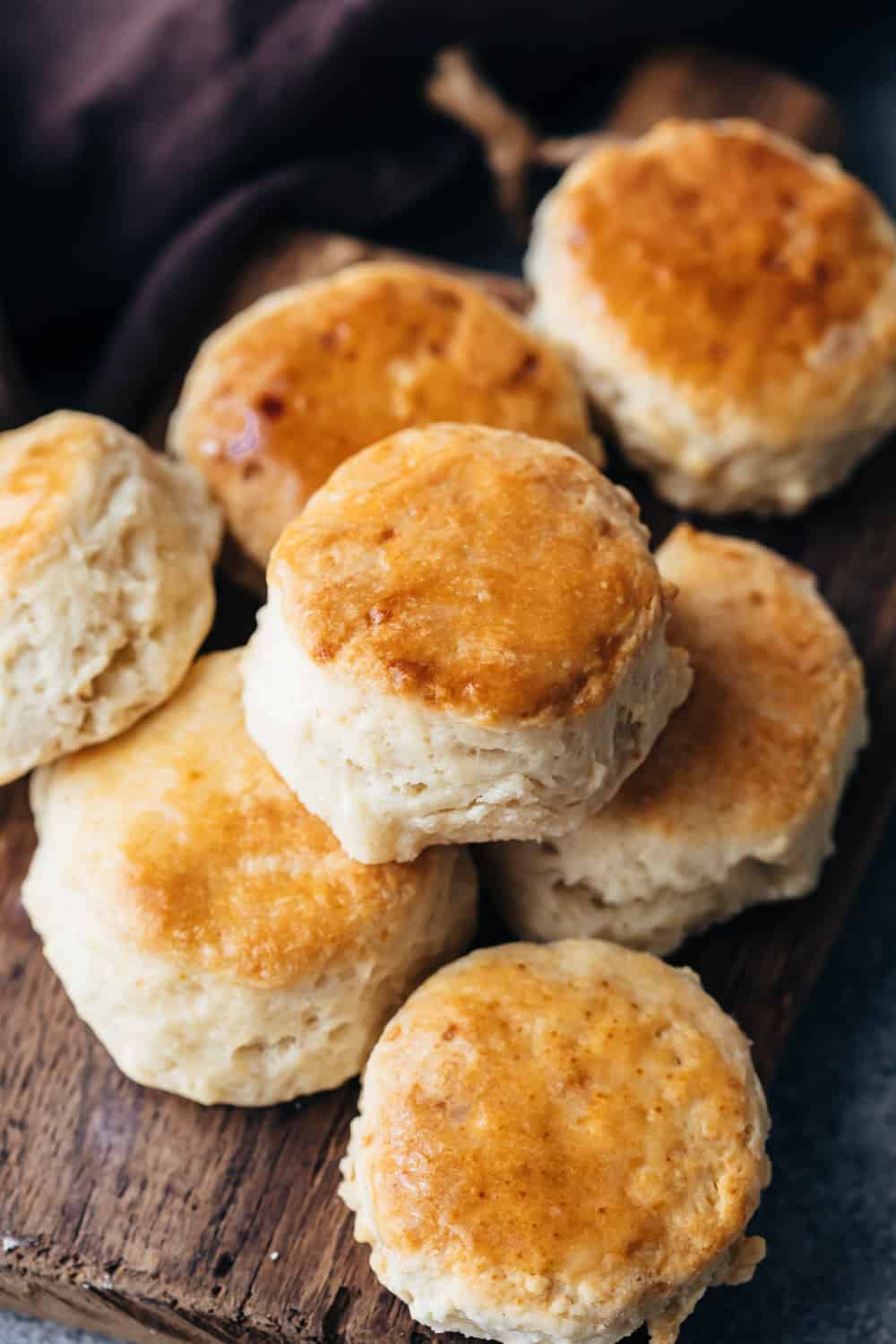 Buttermilk biscuits piled one on top of the other