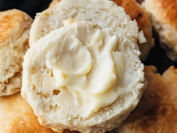 Butter slathered on buttermilk buscuits