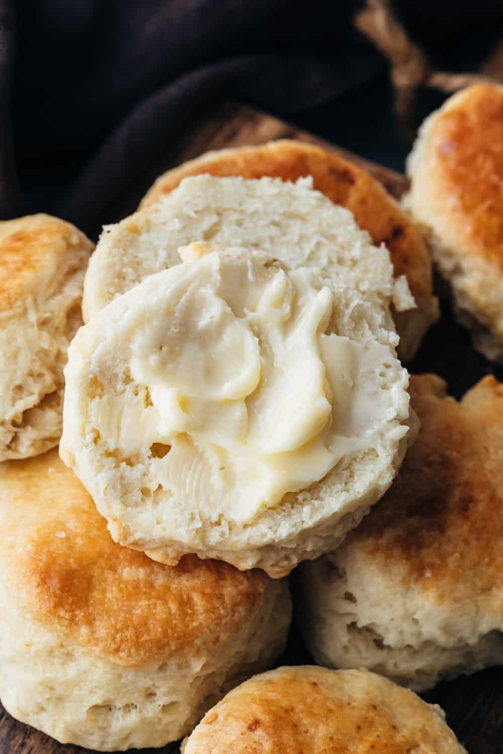 Butter slathered on buttermilk buscuits