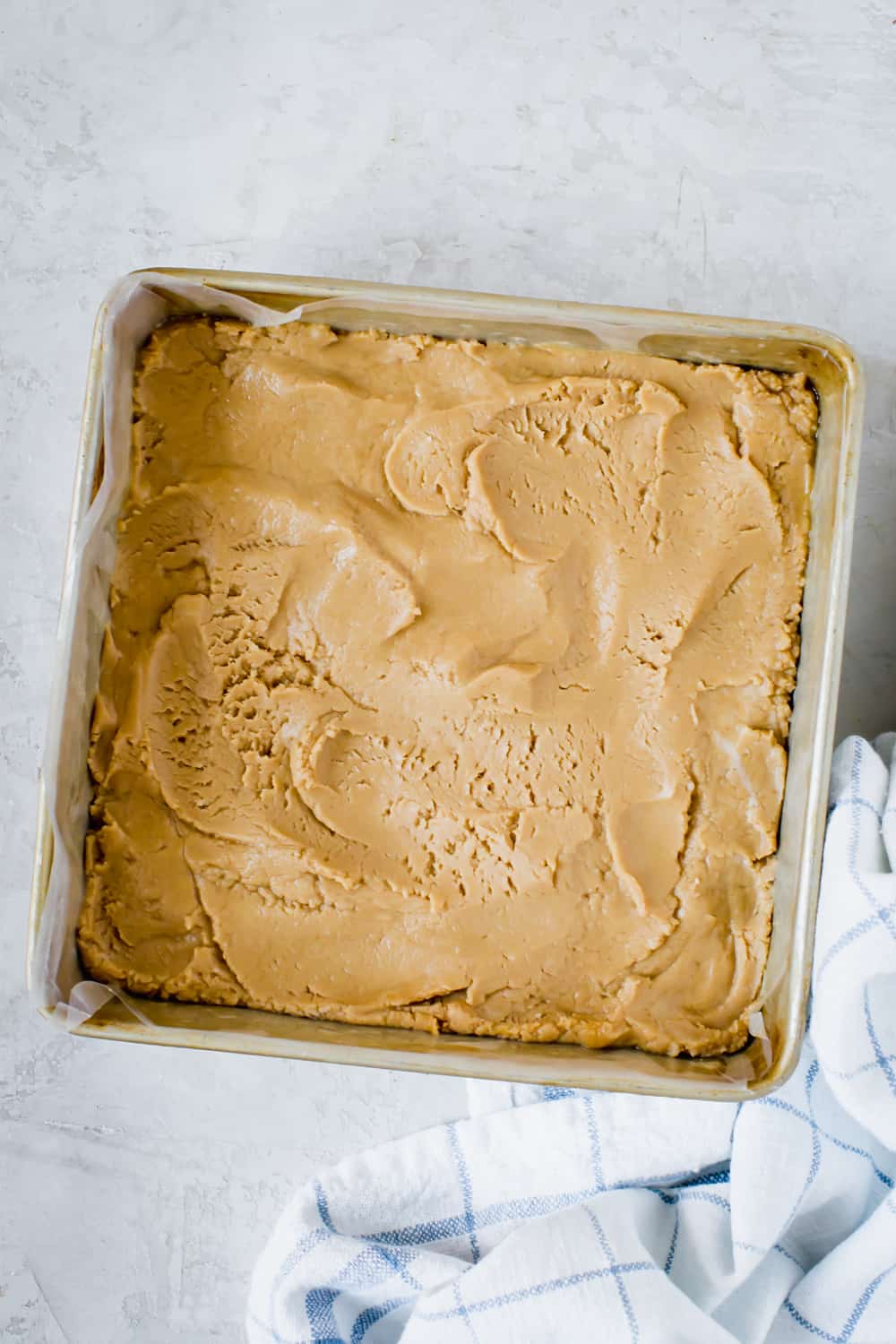 peanut butter fudge smoothed into pan