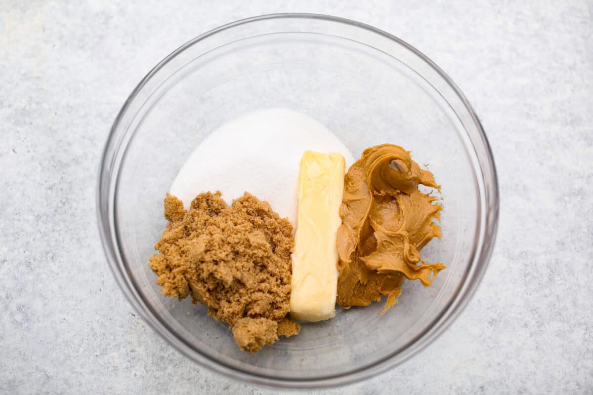 Overhead shot of the sugars, butter and peanut butter in a bowl. 