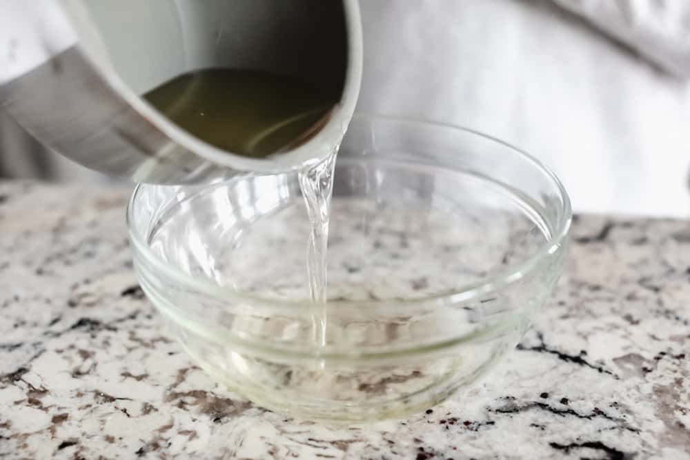 Pouring oils into bowl