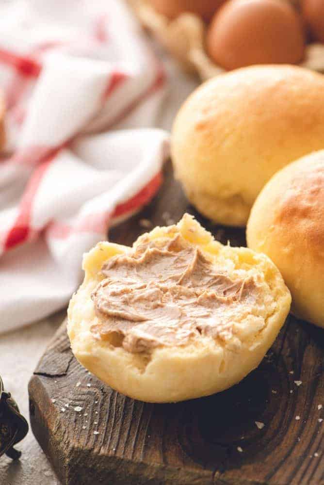 Warm soft rolls with cinnamon honey butter.