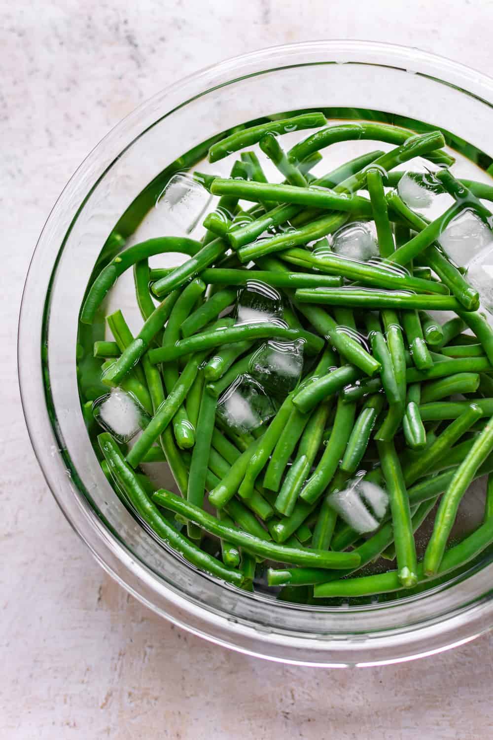 Garlic Butter String Beans in a bowl with water